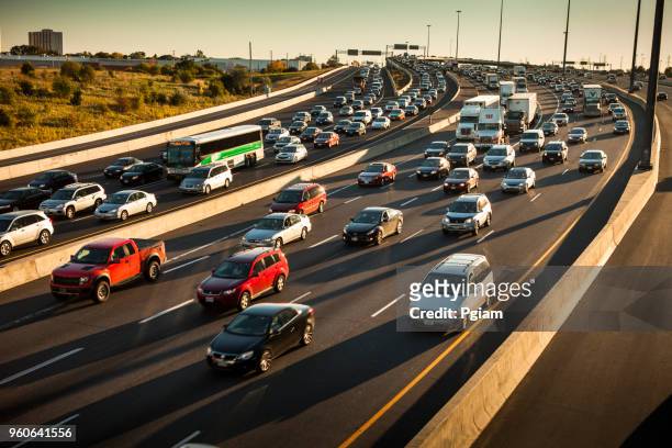 rush hour traffic jam on the freeway in toronto canada - toronto highway stock pictures, royalty-free photos & images