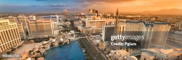 las vegas city skyline and bellagio hotel water fountain, nevada, usa - nevada skyline stock pictures, royalty-free photos & images