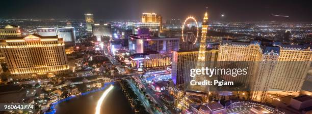 las vegas city skyline and bellagio hotel water fountain, nevada, usa - las vegas skyline night stock pictures, royalty-free photos & images