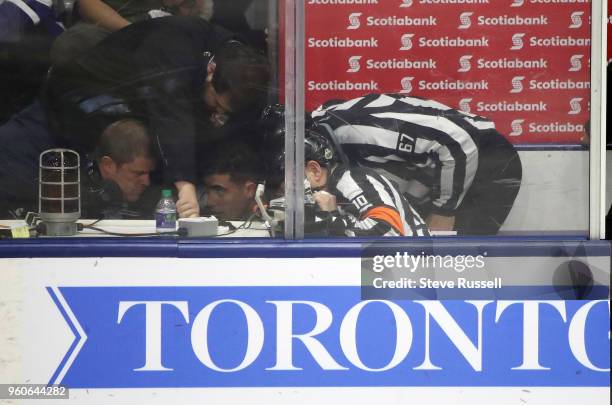 In overtime referees pile into the time keepers' booth to review Lehigh Valley Phantoms overtime goal, it was determined that the puck did not enter...