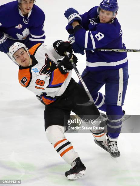 Toronto Marlies defenseman Travis Dermott collides with Lehigh Valley Phantoms right wing Nicolas Aube-Kubel as the Toronto Marlies play the Lehigh...