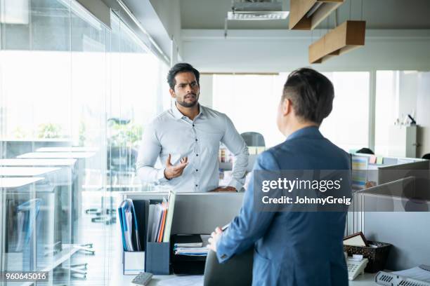 two businessman in serious discussion - bad employee stock pictures, royalty-free photos & images