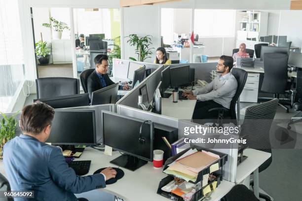 multi racial business people working in modern office - cubicles imagens e fotografias de stock