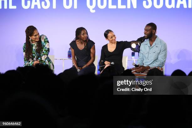 Director Ava DuVernay, Rutina Wesley, Dawn-Lyen Gardner and Kofi Siriboe of Queen Sugar seen on a camera phone screen during "Ava DuVernay and the...