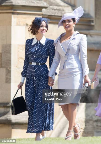 Abigail Spencer and Priyanka Chopra attend the wedding of Prince Harry to Ms Meghan Markle at St George's Chapel, Windsor Castle on May 19, 2018 in...