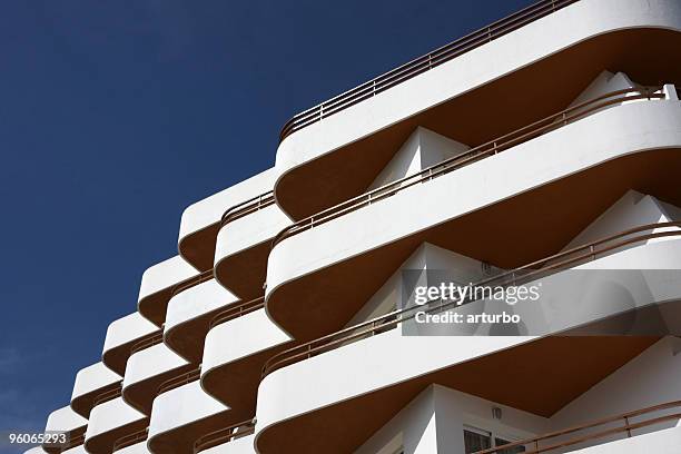 white and orange hotel facade with balconies - ibiza town stock pictures, royalty-free photos & images