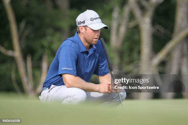 Tyler Duncan reads the green on the 17th hole during the final round of the AT&T Byron Nelson on May 20, 2018 at Trinity Forest Golf Club in Dallas,...