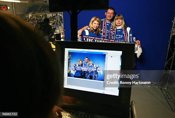 Fans of 1. FFC Turbine Potsdam pose for a picture during the T-Home DFB Indoor Cup at the Boerdelandhalle on January 23, 2010 in Magdeburg, Germany.