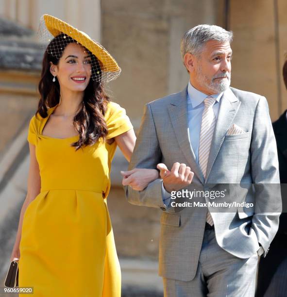 Amal Clooney and George Clooney attend the wedding of Prince Harry to Ms Meghan Markle at St George's Chapel, Windsor Castle on May 19, 2018 in...
