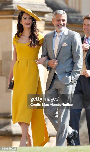 Amal Clooney and George Clooney attend the wedding of Prince Harry to Ms Meghan Markle at St George's Chapel, Windsor Castle on May 19, 2018 in...