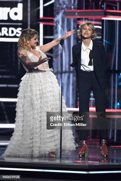 Recording artists Julia Michaels and Grace Vanderwaal speak onstage during the 2018 Billboard Music Awards at MGM Grand Garden Arena on May 20, 2018...