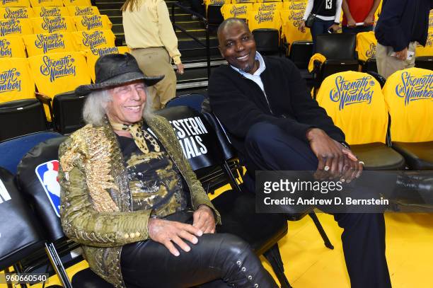 James Goldstein and Hakeem Olajuwon attend the game between the Houston Rockets and the Golden State Warriors during Game Three of the Western...