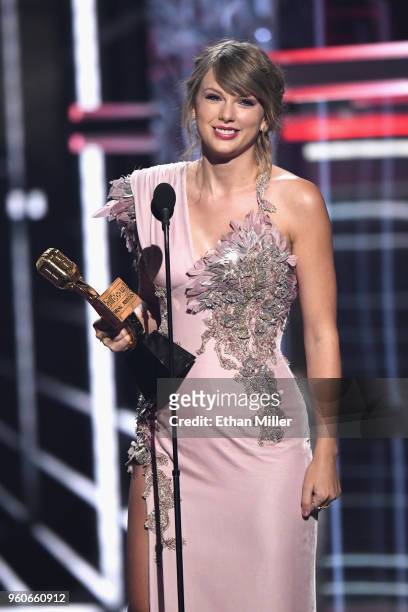 Recording artist Taylor Swift accepts an award onstage during the 2018 Billboard Music Awards at MGM Grand Garden Arena on May 20, 2018 in Las Vegas,...