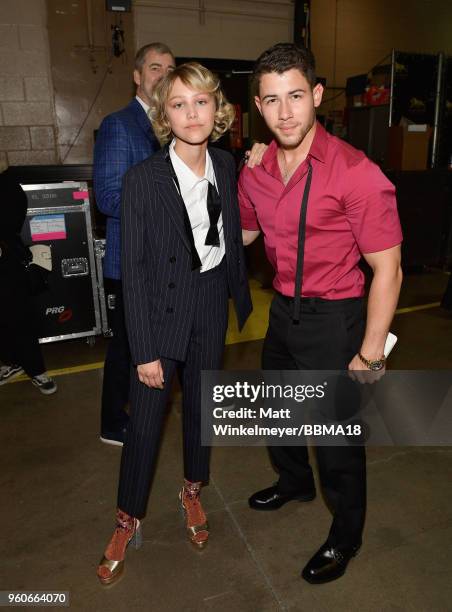 Recording artists Grace VanderWaal and Nick Jonas backstage at the 2018 Billboard Music Awards at MGM Grand Garden Arena on May 20, 2018 in Las...