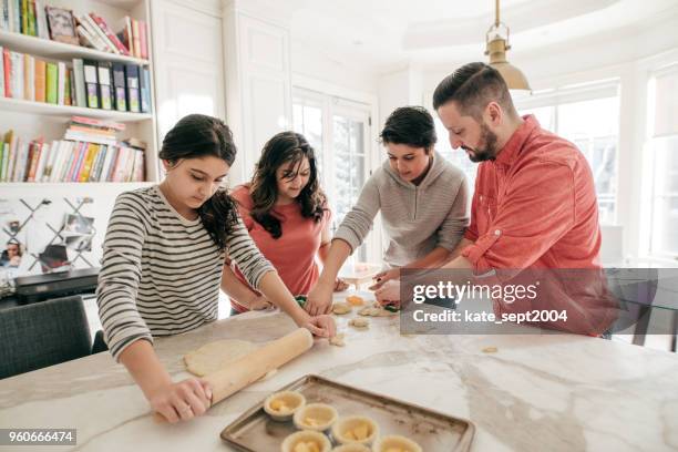 managing a small family business - greek ethnicity stock pictures, royalty-free photos & images