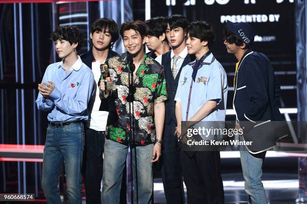 Music group BTS accepts the Top Social Artist award onstage during the 2018 Billboard Music Awards at MGM Grand Garden Arena on May 20, 2018 in Las...