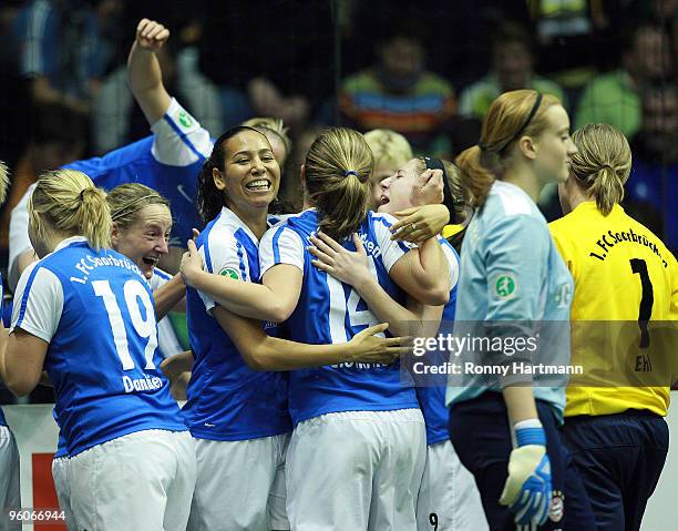 Players of 1. FC Saarbruecken celebrate after winning their quarter final match against FCR 2001 Duisburg during the T-Home DFB Indoor Cup at the...
