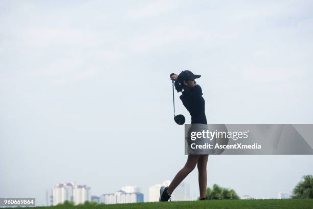 golfer making the drive - golfer stock pictures, royalty-free photos & images