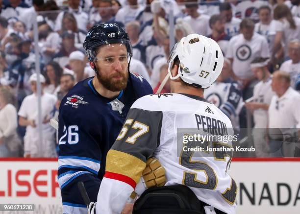 Blake Wheeler of the Winnipeg Jets shakes hands with David Perron of the Vegas Golden Knights following a 2-1 Knights victory in Game Five of the...