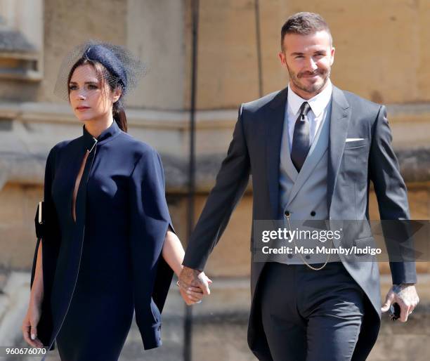 Victoria Beckham and David Beckham attend the wedding of Prince Harry to Ms Meghan Markle at St George's Chapel, Windsor Castle on May 19, 2018 in...