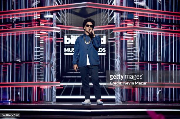Recording artist Bruno Mars speaks onstage at the 2018 Billboard Music Awards at MGM Grand Garden Arena on May 20, 2018 in Las Vegas, Nevada.