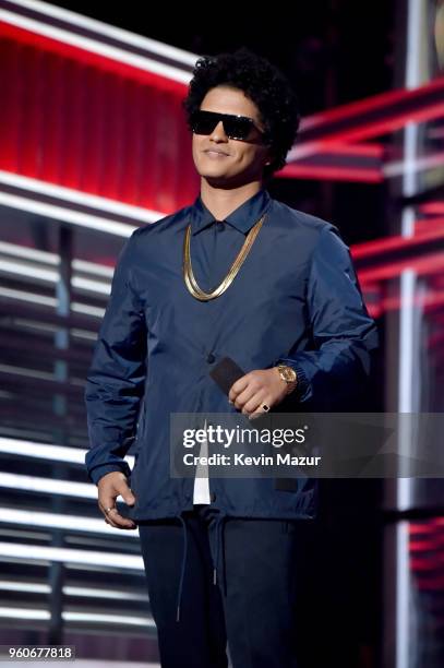 Recording artist Bruno Mars speaks onstage at the 2018 Billboard Music Awards at MGM Grand Garden Arena on May 20, 2018 in Las Vegas, Nevada.