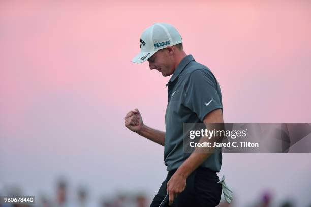 Aaron Wise celebrates following his par putt on the 18th green during the final round to win the AT&T Byron Nelson at Trinity Forest Golf Club on May...