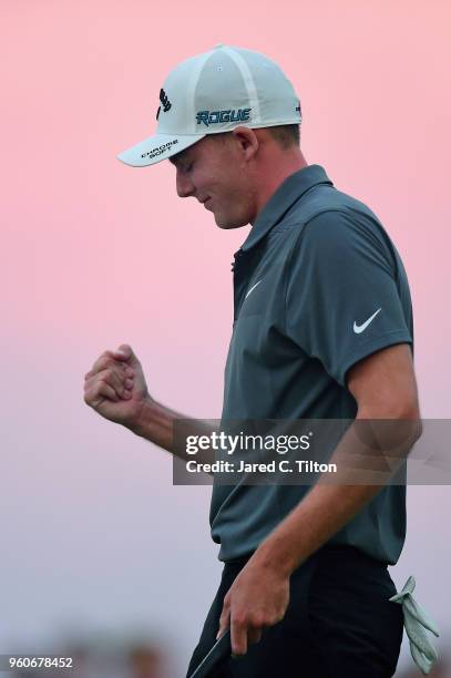 Aaron Wise celebrates following his par putt on the 18th green during the final round to win the AT&T Byron Nelson at Trinity Forest Golf Club on May...