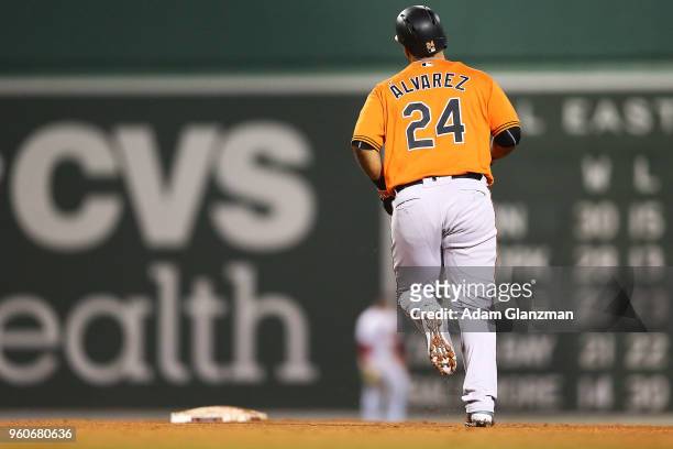 Pedro Alvarez of the Baltimore Orioles rounds the bases after hitting a two-run home run in the sixth inning of a game against the Boston Red Sox at...
