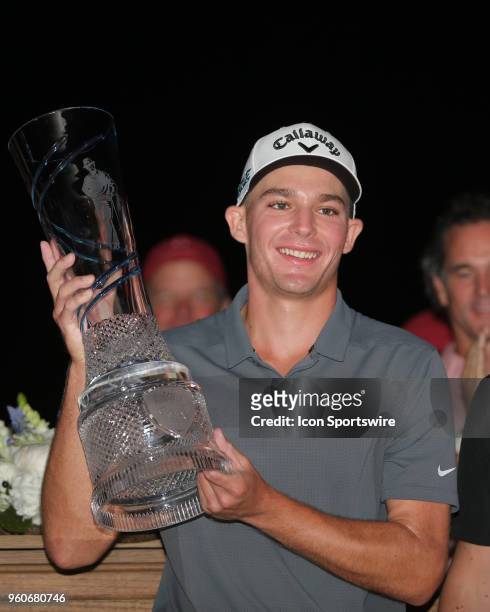 Aaron Wise poses with the trophy after winning the AT&T Byron Nelson on May 20, 2018 at Trinity Forest Golf Club in Dallas, TX.