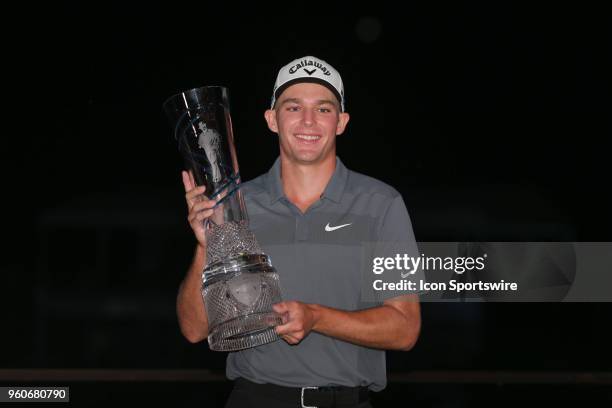 Aaron Wise poses with the trophy after winning the AT&T Byron Nelson on May 20, 2018 at Trinity Forest Golf Club in Dallas, TX.