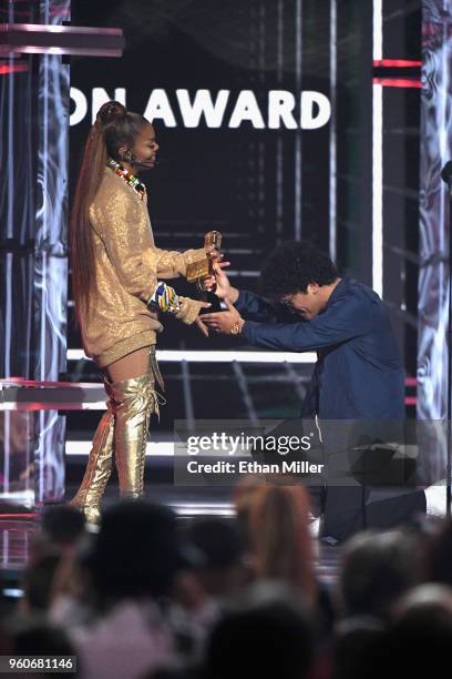 Janet Jackson accepts the Icon Award from Bruno Mars onstage during the 2018 Billboard Music Awards at MGM Grand Garden Arena on May 20, 2018 in Las...