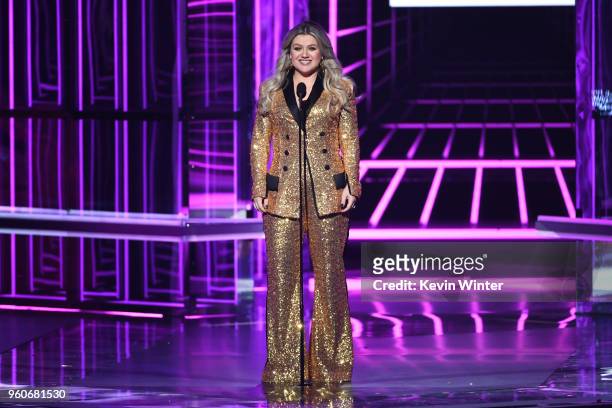 Host Kelly Clarkson speaks onstage during the 2018 Billboard Music Awards at MGM Grand Garden Arena on May 20, 2018 in Las Vegas, Nevada.