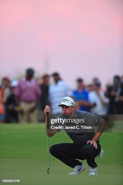 Aaron Wise lines up his birdie putt on the 18th green during the final round of the AT&T Byron Nelson at Trinity Forest Golf Club on May 20, 2018 in...