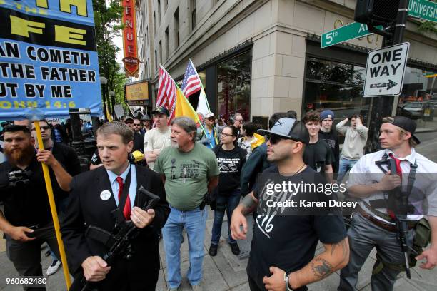 Joey Gibson , leader of the Patriot Prayer group, leads a march advocating the right to openly carry guns in public, on May 20, 2018 in Seattle,...