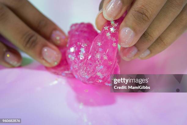 slime toy - mamigibbs imagens e fotografias de stock