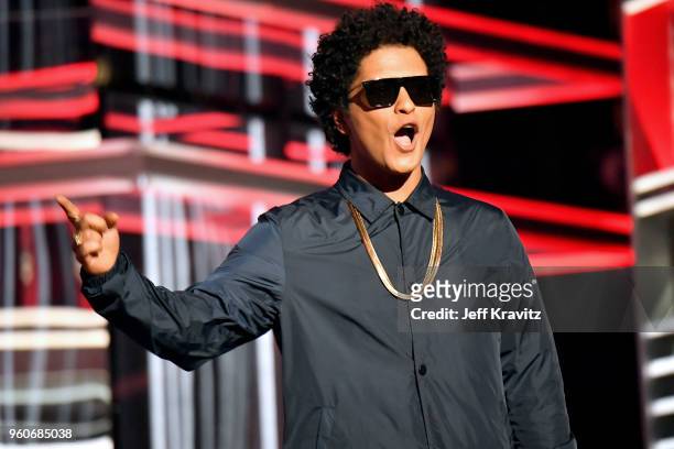 Recording artist Bruno Mars speaks onstage during the 2018 Billboard Music Awards at MGM Grand Garden Arena on May 20, 2018 in Las Vegas, Nevada.