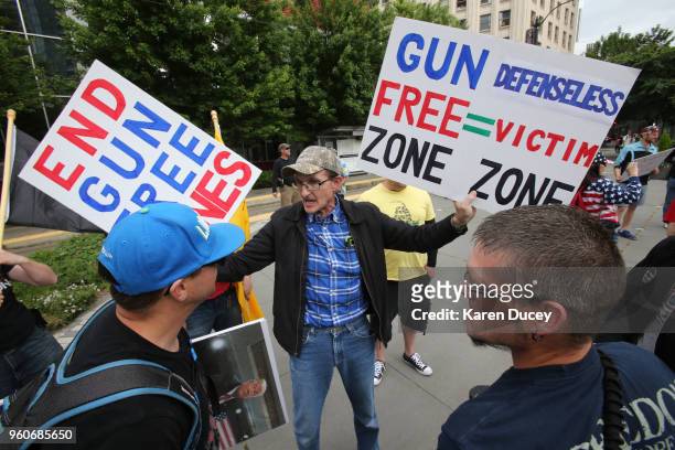 Gerry Matheson, a school teacher from Spokane, Washington, participates in a guns rights rally on May 20, 2018 in Seattle, Washington. The rally was...
