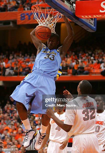 Jimmy Butler of the Marquette Golden Eagles dunks the ball during the game against the Syracuse Orange at Carrier Dome on January 23, 2010 in...