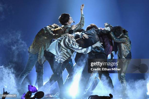 Musical group BTS performs onstage during the 2018 Billboard Music Awards at MGM Grand Garden Arena on May 20, 2018 in Las Vegas, Nevada.