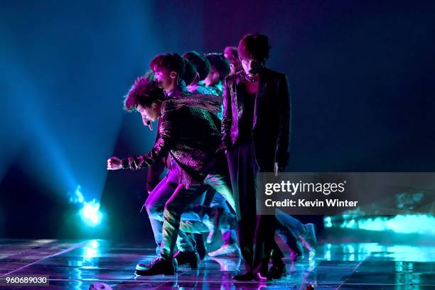 Music group BTS performs onstage during the 2018 Billboard Music Awards at MGM Grand Garden Arena on May 20, 2018 in Las Vegas, Nevada.