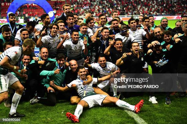 Santos players celebrate their triumph against Toluca in the Mexican Clausura 2018 tournament football final match at the Nemesio Diez stadium on May...