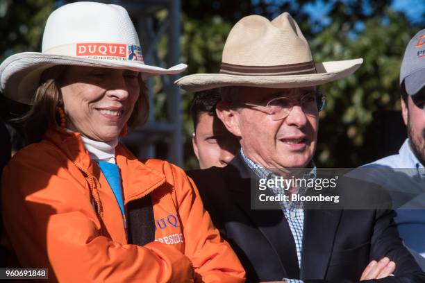 Alvaro Uribe, former president of Colombia, right, attends the closing campaign rally of Ivan Duque, presidential candidate for the Democratic Center...