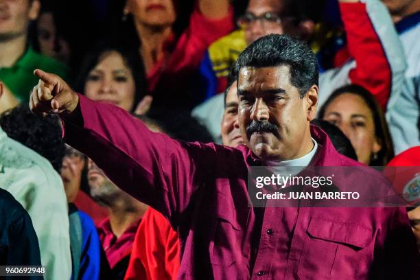 Venezuelan President Nicolas Maduro gestures after the National Electoral Council announced the results of the voting on election day in Venezuela,...