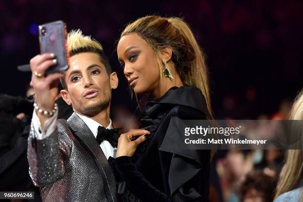 Personality Frankie J. Grande and Model-TV personality Tyra Banks attend the 2018 Billboard Music Awards at MGM Grand Garden Arena on May 20, 2018 in...