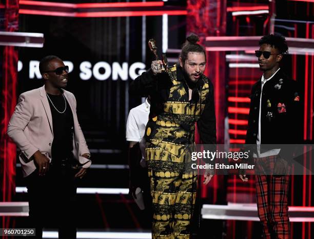 Post Malone and 21 Savage accept an award onstage during the 2018 Billboard Music Awards at MGM Grand Garden Arena on May 20, 2018 in Las Vegas,...