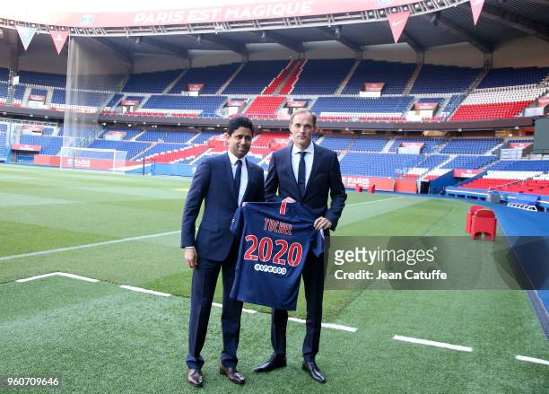 Thomas Tuchel of Germany is presented by President of PSG Nasser Al Khelaifi as new coach of Paris Saint-Germain at Parc des Princes stadium on May...