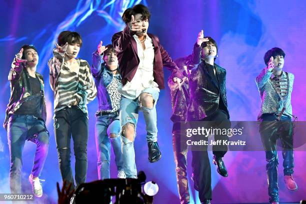 Musical group BTS perform onstage during the 2018 Billboard Music Awards at MGM Grand Garden Arena on May 20, 2018 in Las Vegas, Nevada.