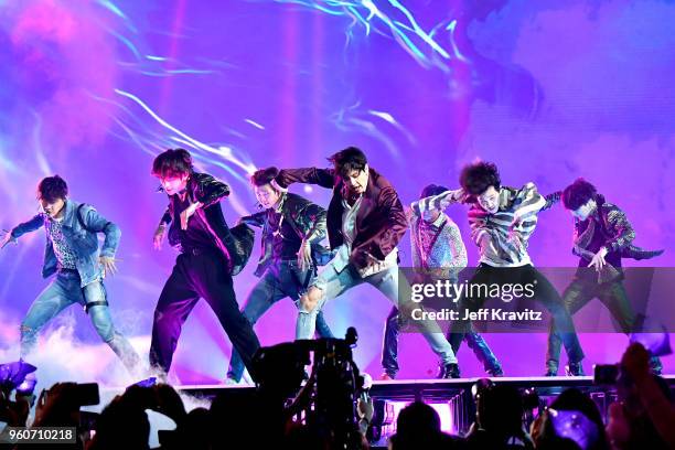 Musical group BTS perform onstage during the 2018 Billboard Music Awards at MGM Grand Garden Arena on May 20, 2018 in Las Vegas, Nevada.