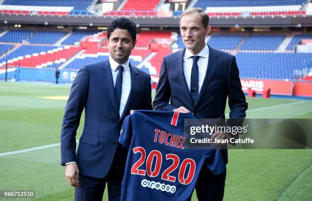 Thomas Tuchel of Germany is presented by President of PSG Nasser Al Khelaifi as new coach of Paris Saint-Germain at Parc des Princes stadium on May...